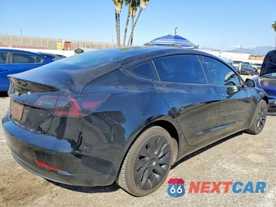 Trzecie zdjęcie samochodu z tyłu: 2019 TESLA MODEL 3 VIN:5YJ3E1EA9KF396049 - miniatura