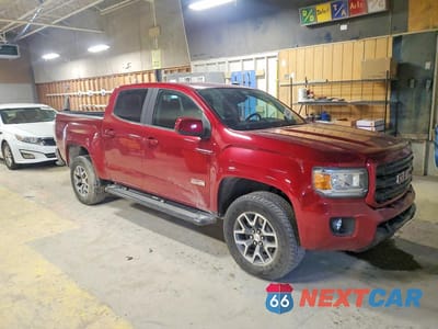 Czwarte zdjęcie samochodu z boku: 2018 GMC CANYON SLE VIN:1GTG6CENXJ1219028 - miniatura