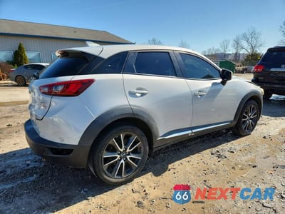 Trzecie zdjęcie samochodu z tyłu: 2016 MAZDA CX-3 GRAND TOURING VIN:JM1DKBD77G0121441 - miniatura