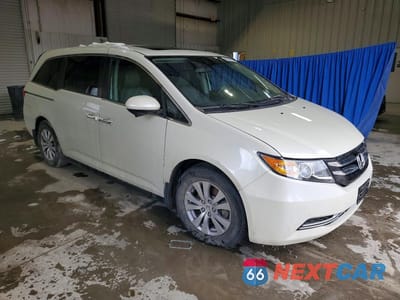 Czwarte zdjęcie samochodu z boku: 2016 HONDA ODYSSEY EXL VIN:5FNRL5H67GB057604 - miniatura