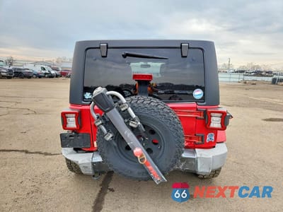 Zdjęcie 6 z 12 samochodu: 2014 JEEP WRANGLER UNLIMITED SPORT VIN:1C4BJWDG3EL182086 - miniatura