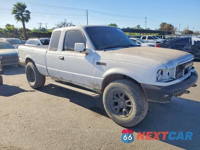 Czwarte zdjęcie samochodu z boku: 2010 FORD RANGER SUPER CAB VIN:1FTLR4FE4APA26364 - miniatura