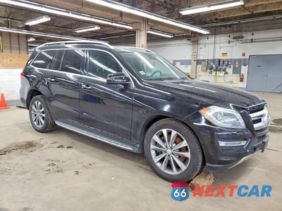 Czwarte zdjęcie samochodu z boku: 2013 MERCEDES-BENZ GL 450 4MATIC VIN:4JGDF7CE5DA205759 - miniatura