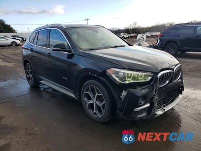 Czwarte zdjęcie samochodu z boku: 2016 BMW X1 XDRIVE28I VIN:WBXHT3Z3XG4A48199 - miniatura