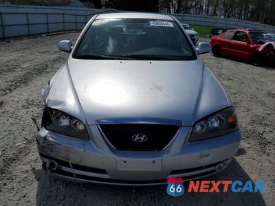 Piąte zdjęcie samochodu w środku: 2004 HYUNDAI ELANTRA GLS VIN:KMHDN46D24U875000 - miniatura