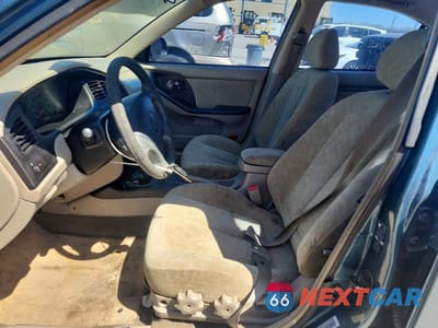 Zdjęcie 7 z 11 samochodu: 2002 HYUNDAI ELANTRA GLS VIN:KMHDN45D22U418489 - miniatura