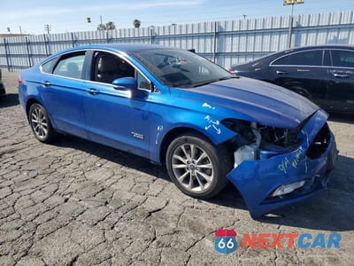 Czwarte zdjęcie samochodu z boku: 2017 FORD FUSION SE PHEV VIN:3FA6P0PU4HR409778 - miniatura