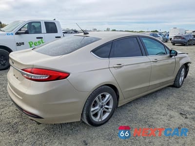 Trzecie zdjęcie samochodu z tyłu: 2018 FORD FUSION SE HYBRID VIN:3FA6P0LU2JR226925 - miniatura