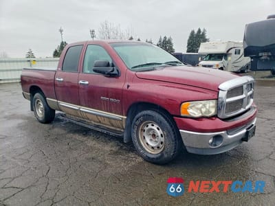 Czwarte zdjęcie samochodu z boku: 2002 DODGE RAM 1500 VIN:3D7HA18N32G140599 - miniatura