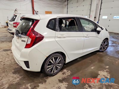 Trzecie zdjęcie samochodu z tyłu: 2016 HONDA FIT EX VIN:JHMGK5H78GX027163 - miniatura