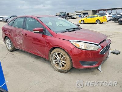 Czwarte zdjęcie samochodu z boku: 2017 FORD FOCUS VIN:1FADP3F28HL328676 - miniatura