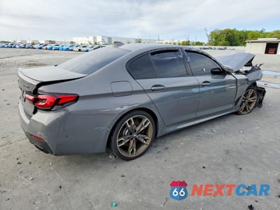 Trzecie zdjęcie samochodu z tyłu: 2021 BMW M550XI VIN:WBA13BK01MCF22757 - miniatura