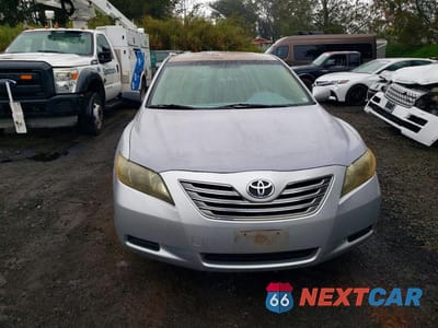 Piąte zdjęcie samochodu w środku: 2007 TOYOTA CAMRY HYBRID BASE VIN:JTNBB46K773035223 - miniatura