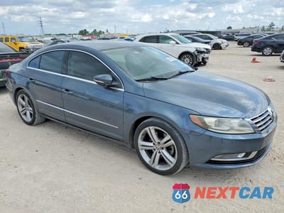 Czwarte zdjęcie samochodu z boku: 2013 VOLKSWAGEN CC SPORT VIN:WVWBN7AN6DE511007 - miniatura