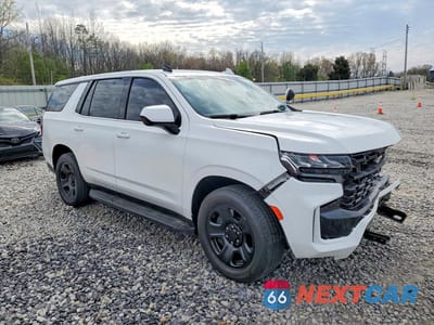 Czwarte zdjęcie samochodu z boku: 2022 CHEVROLET TAHOE C1500 VIN:1GNSCLED9NR247816 - miniatura