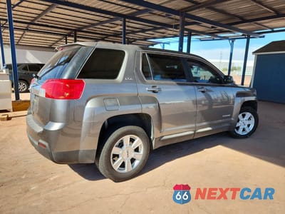 Trzecie zdjęcie samochodu z tyłu: 2012 GMC TERRAIN SLE VIN:2GKALMEK5C6125198 - miniatura
