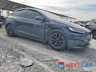 Czwarte zdjęcie samochodu z boku: 2022 TESLA MODEL X VIN:7SAXCDE5XNF356176 - miniatura