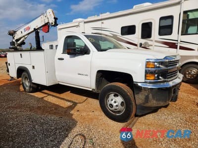 Czwarte zdjęcie samochodu z boku: 2017 CHEVROLET SILVERADO UTILITY / SERVICE TRUCK VIN:1GB3KYCG5HZ311515 - miniatura