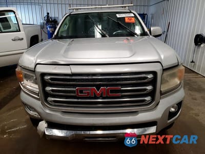 Piąte zdjęcie samochodu w środku: 2016 GMC CANYON SLE VIN:1GTP6CE19G1383229 - miniatura