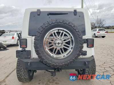 Zdjęcie 6 z 11 samochodu: 2013 JEEP WRANGLER UNLIMITED SAHARA VIN:1C4BJWEG5DL554329 - miniatura