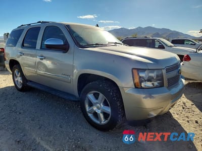 Czwarte zdjęcie samochodu z boku: 2013 CHEVROLET TAHOE K1500 LTZ VIN:1GNSKCE07DR289397 - miniatura