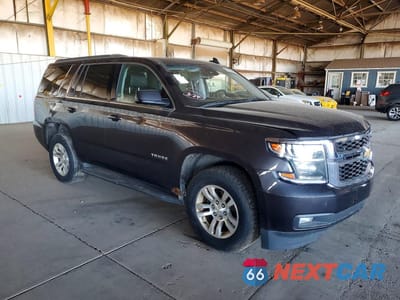 Czwarte zdjęcie samochodu z boku: 2016 CHEVROLET TAHOE K1500 LT VIN:1GNSKBKC8GR103640 - miniatura