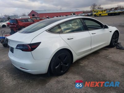 Trzecie zdjęcie samochodu z tyłu: 2020 TESLA MODEL 3 VIN:5YJ3E1EA0LF794073 - miniatura