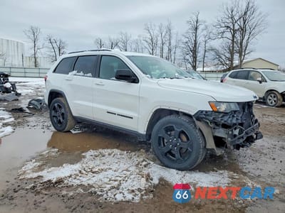 Czwarte zdjęcie samochodu z boku: 2019 JEEP GRAND CHEROKEE LAREDO VIN:1C4RJFAG1KC547265 - miniatura