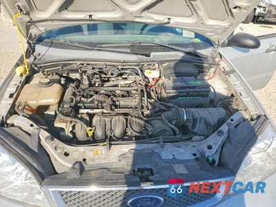 Zdjęcie 11 z 11 samochodu: 2006 FORD FOCUS ZX4 VIN:1FAFP34N86W250479 - miniatura