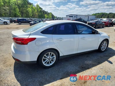 Trzecie zdjęcie samochodu z tyłu: 2016 FORD FOCUS SE VIN:1FADP3F29GL360583 - miniatura