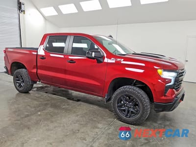 Czwarte zdjęcie samochodu z boku: 2023 CHEVROLET SILVERADO K1500 LT TRAIL BOSS VIN:3GCUDFED7PG213537 - miniatura