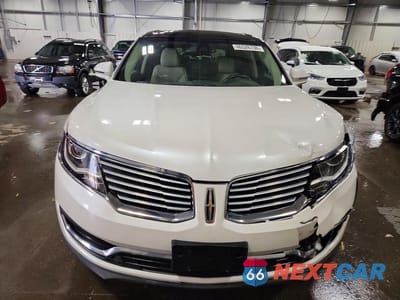 Piąte zdjęcie samochodu w środku: 2016 LINCOLN MKX RESERVE VIN:2LMTJ8LR1GBL43556 - miniatura