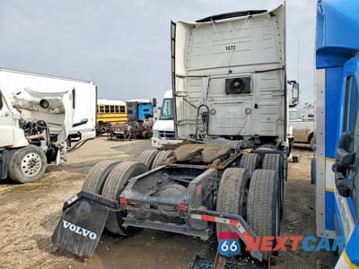 Czwarte zdjęcie samochodu z boku: 2024 VOLVO VNL SEMI TRUCK VIN:4V4NC9EH9RN641099 - miniatura