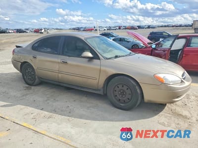 Czwarte zdjęcie samochodu z boku: 2003 FORD TAURUS SES VIN:1FAFP55U63A259918 - miniatura