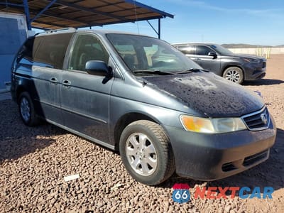 Czwarte zdjęcie samochodu z boku: 2004 HONDA ODYSSEY EX VIN:5FNRL18874B104409 - miniatura