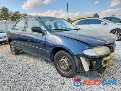 Czwarte zdjęcie samochodu z boku: 1996 MAZDA PROTEGE DX VIN:JM1BB1415T0327980 - miniatura