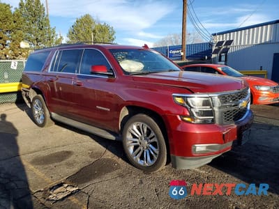 Czwarte zdjęcie samochodu z boku: 2016 CHEVROLET SUBURBAN K1500 LT VIN:1GNSKHKC1GR167229 - miniatura