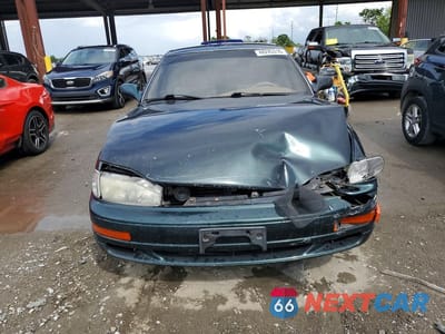 Piąte zdjęcie samochodu w środku: 1993 TOYOTA CAMRY LE VIN:4T1SK12E8PU323597 - miniatura