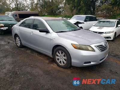 Czwarte zdjęcie samochodu z boku: 2007 TOYOTA CAMRY HYBRID BASE VIN:JTNBB46K773035223 - miniatura