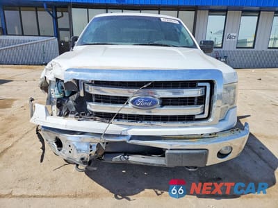 Piąte zdjęcie samochodu w środku: 2014 FORD F150 SUPERCREW VIN:1FTFW1EF0EFC11604 - miniatura