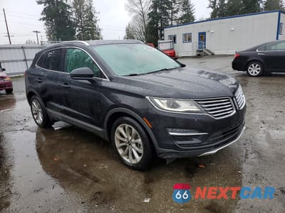 Czwarte zdjęcie samochodu z boku: 2015 LINCOLN MKC VIN:5LMCJ2A97FUJ25316 - miniatura