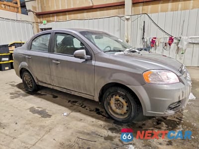 Czwarte zdjęcie samochodu z boku: 2010 CHEVROLET AVEO LS VIN:KL1TD5DE7AB098431 - miniatura