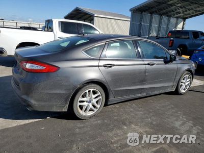 Trzecie zdjęcie samochodu z tyłu: 2016 FORD FUSION SE VIN:3FA6P0H74GR282649 - miniatura