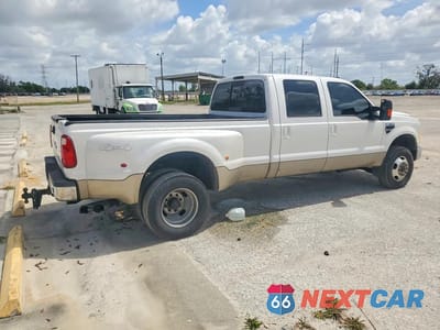 Trzecie zdjęcie samochodu z tyłu: 2010 FORD F350 SUPER DUTY VIN:1FTWW3DR5AEA50593 - miniatura