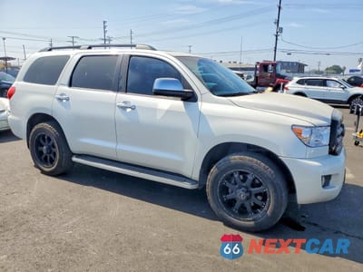 Czwarte zdjęcie samochodu z boku: 2013 TOYOTA SEQUOIA PLATINUM VIN:5TDDY5G16DS074466 - miniatura