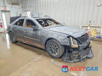 Czwarte zdjęcie samochodu z boku: 2006 CADILLAC STS VIN:1G6DC67A060159803 - miniatura