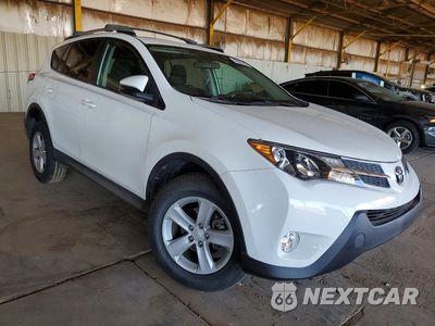 Czwarte zdjęcie samochodu z boku: 2014 TOYOTA RAV4 XLE VIN:2T3WFREVXEW125124 - miniatura