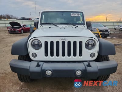 Piąte zdjęcie samochodu w środku: 2015 JEEP WRANGLER UNLIMITED SPORT VIN:1C4BJWDG9FL768938 - miniatura