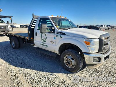 Czwarte zdjęcie samochodu z boku: 2015 FORD F350 SUPER DUTY FLATBED TRUCK VIN:1FDRF3HT7FEA10747 - miniatura