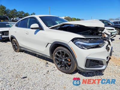 Czwarte zdjęcie samochodu z boku: 2021 BMW X6 SDRIVE 40I VIN:5UXCY4C06M9G35025 - miniatura